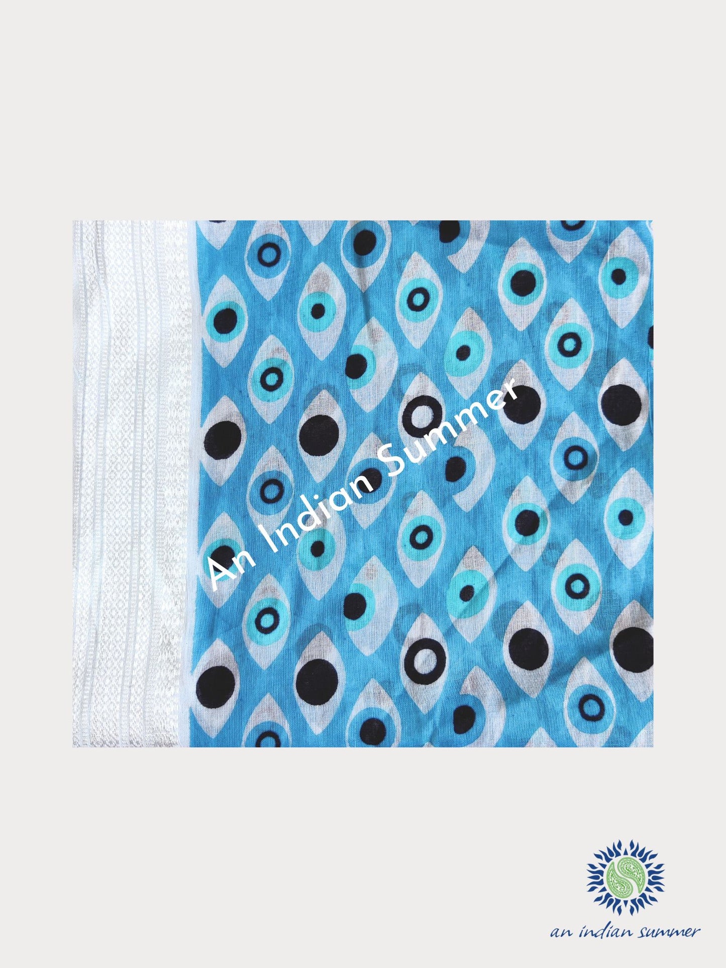 Evil Eye Woven Border Sarong Pareo | Light Blue | Hand Block Printed | Soft Cotton Voile | An Indian Summer | Resortwear Swimwear Beachwear | Seasonless Timeless Sustainable Ethical Authentic Artisan Conscious Clothing Lifestyle Brand