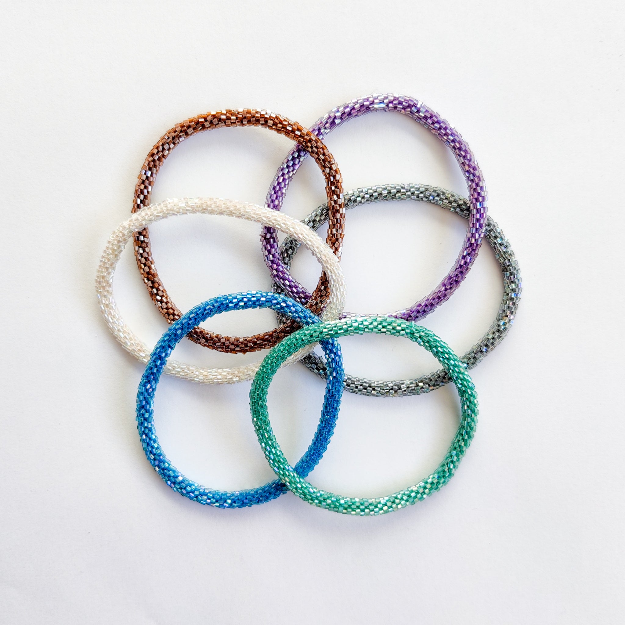 Diy Friendship Bracelets Indian Colorful Pattern Handmade Thread White  Background Stock Photo by ©TanyaTerekhina 499701106