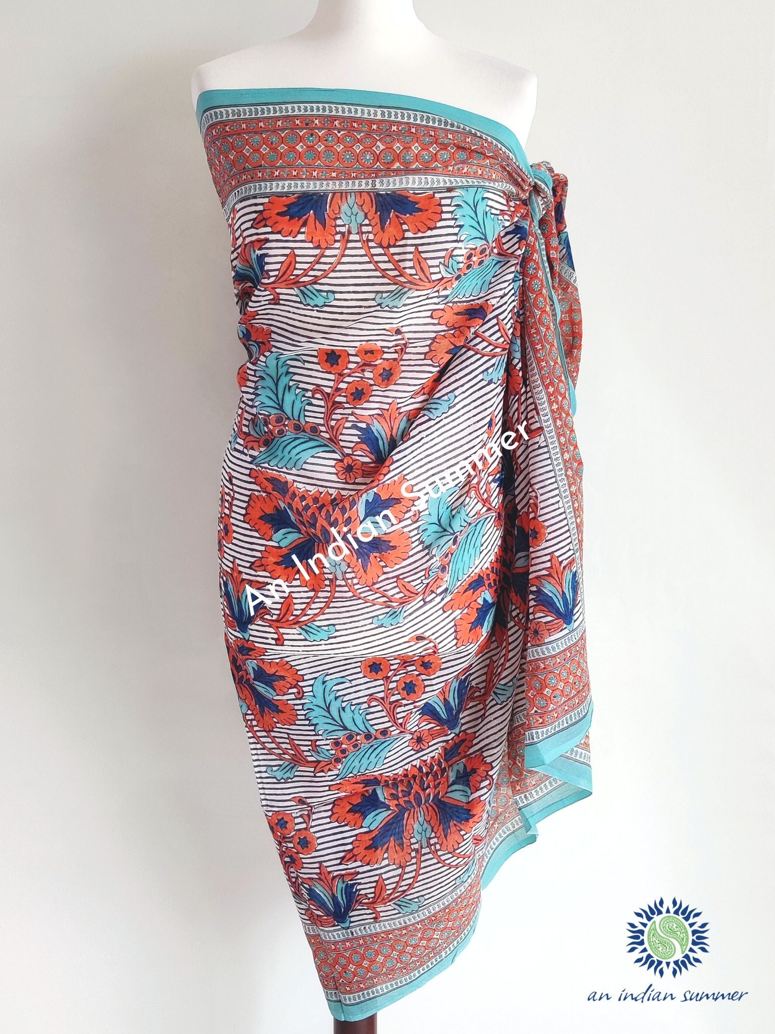 Seville Sarong Pareo | Blue & Orange Floral & Stripe Print | Hand Block Printed | Soft Cotton Voile | An Indian Summer | Resortwear Swimwear Beachwear | Seasonless Timeless Sustainable Ethical Authentic Artisan Conscious Clothing Lifestyle Brand
